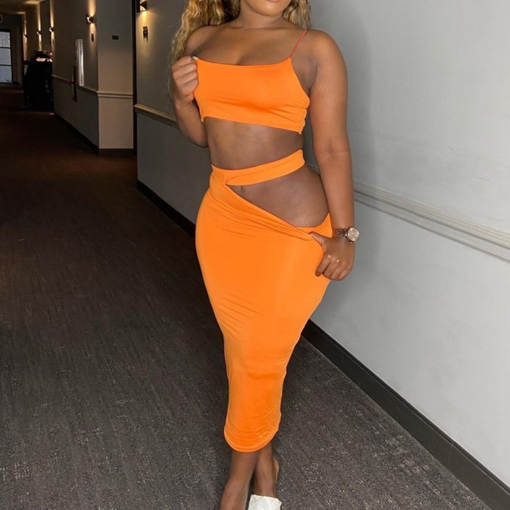 Orange 2 piece midi skirt set with cut out